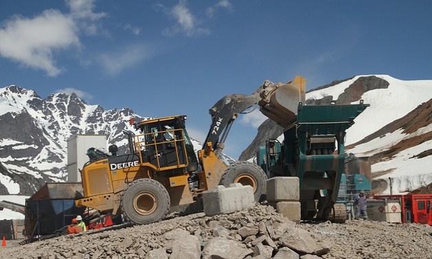 A front-end loader unloads excavated material from Pretium Resources Inc.'s bulk sample program at the company's Brucejack project.