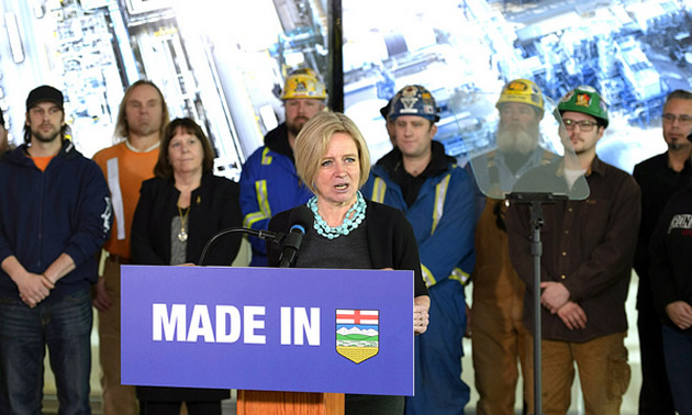 Rachel Notley speaking at press conference.