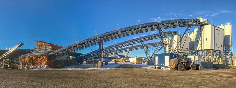 A picture of heavy construction equipment and structures at Site C dam.